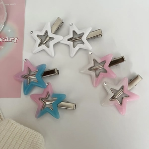 Set of six Y2K star-shaped hair clips in white and blue-pink gradient colors