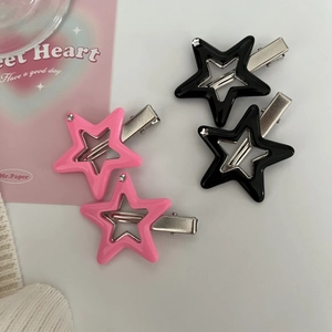 Y2K star hair clips in pink and black with rhinestones on a clean white background