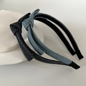 Vintage denim knot headbands in light and dark blue with yellow contrast stitching