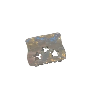 Iridescent hollow star acetate hair claw clip with pearlescent finish for bun hairstyles