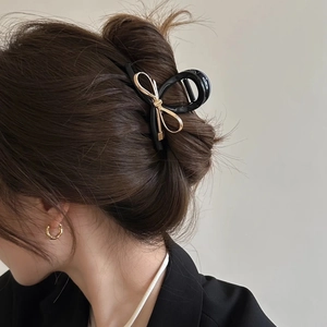 Elegante molletta per capelli nera con fiocco in metallo dorato per acconciature