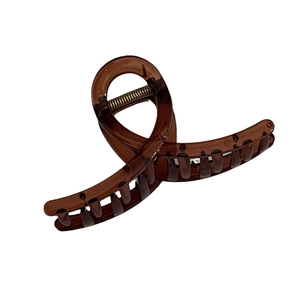 Brown translucent hair claw clip with large teeth and silver spring for thick hair