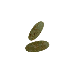 Pair of oval light green hair clips with gold foil resin texture on white background