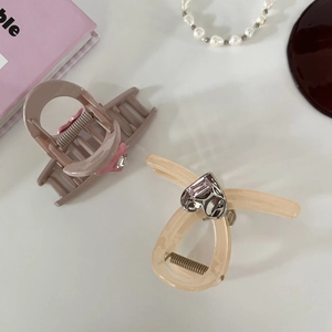 Elegant hair claw clips set with heart accents and gems for women's hair styling