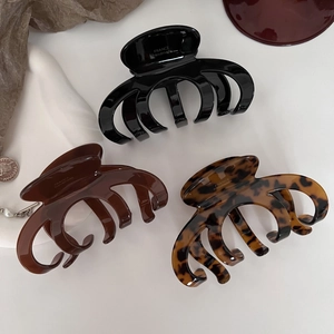 Tre fermagli per capelli in acetato nero, marrone e tartaruga con scritta francese