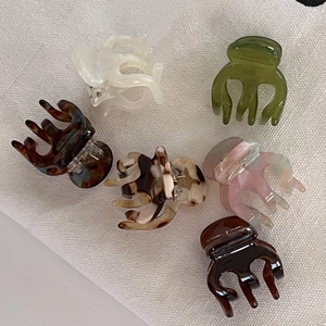 Set of 6 mini acetate claw clips in assorted colors like pearl white and tortoise shell