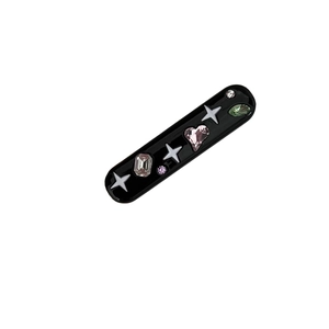 Barrette style Y2K avec strass colorés et motifs d'étoiles sur base noire brillante