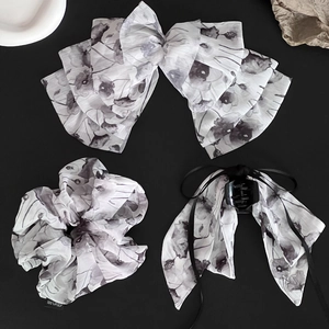 Detailed set of white chiffon bow hair clip, scrunchie and claw clip with ink flower print