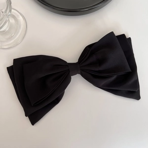 Grande pince à cheveux avec nœud en satin noir au design élégant à la française