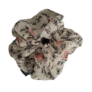 Elegant Chinese style scrunchie with calligraphy and red seal print in beige fabric