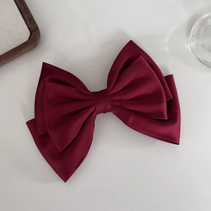 Large vintage burgundy satin layered bow hair clip for an elegant French hair style