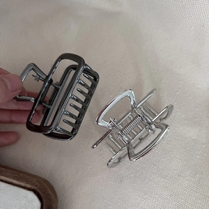 Minimalist square metal hair claw clips in silver and gunmetal for elegant hairstyling