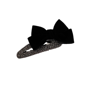 French vintage black velvet bow hair clip with luxury rhinestones on white background