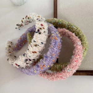 Colorful knitted bean headband set with fuzzy pastel plush texture in four colors