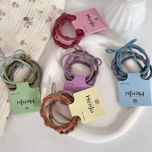 Set of 4 high-elastic colorful hair bands in macaron shades with ribbed fabric texture