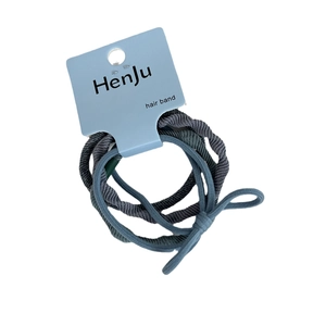 Set of 4 high elasticity colorful fiber hair bands on a blue display card