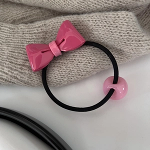 Süßer Haargummi mit rosa Harzschleife und Perle auf schwarzem elastischem Band für Mädchen