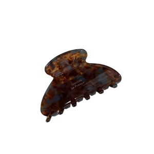 French tortoiseshell acetate shark hair claw clip in dark brown and blue patterns