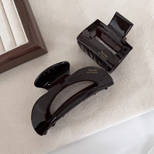 French style dark tortoise shell acetate hair claws with gold Barrette la France lettering
