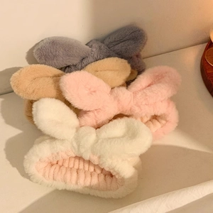 Soft plush bow headbands in four pastel colors for face washing and skincare routines