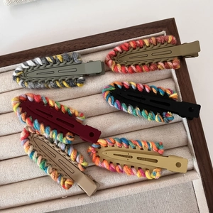 Set of 6 colorful knitted wool alligator hair clips in a premium wooden display box