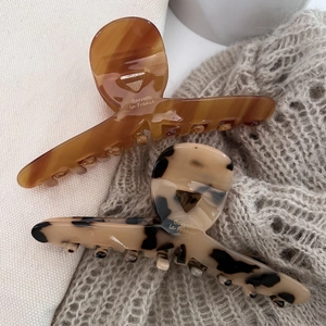 French vintage style amber and marbled acetate hair claw clips with gold lettering