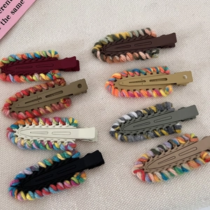 Set of eight colorful knitted yarn duckbill hair clips with a vintage aesthetic