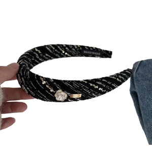 Classic black and white tweed headband with gold sequins and pearl camellia charm