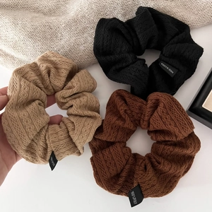 Knitted fabric scrunchies set in beige, brown and black for winter hair styling
