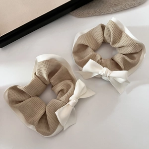 Set of two plaid waffle fabric scrunchies with white silk bow in warm coffee and beige