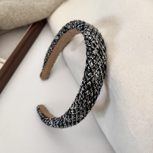 Close-up of vintage black and white tweed headband with silver sequins and thick non-slip liner