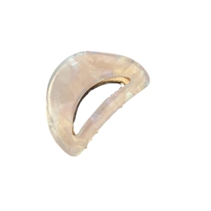 Elegant crescent acetate hair claw clip with pearlescent pink and white marble pattern