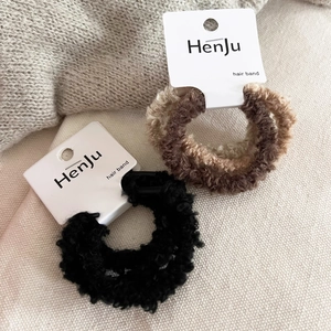 Set of 3 plush faux shearling hair scrunchies in neutral coffee colors for women