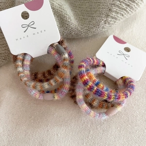 Colorful plush knitted hair ties set with vibrant patchwork yarn and handmade packaging