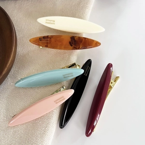 Set of 6 colorful acetate leaf hair clips with golden metal clamps for women