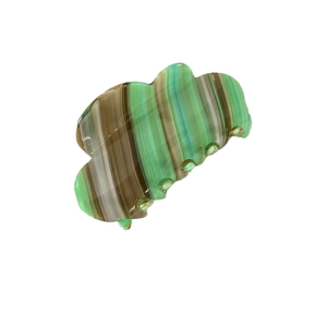 Cloud acetate hair claw clip with green and brown vertical stripes on white background