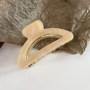 Minimalist acetate semi-circle hair claw clip with creamy yellow marble pattern