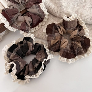 Three-piece set of hazelnut brown plaid scrunchies with elegant lace trim for ponytails