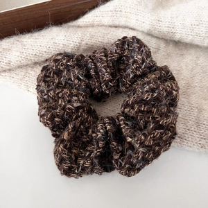 Chunky dark coffee knit scrunchie for women with plush texture and subtle shimmering threads