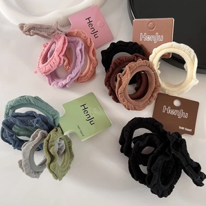 Set of colorful ruffled hair scrunchies in various shades with high elasticity fabric