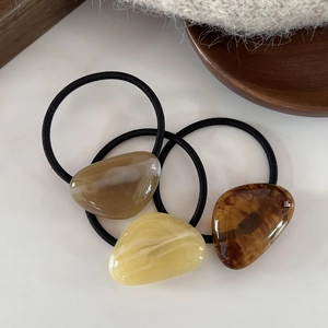 Three-piece geometric hair ties set with marble texture resin charms on high elastic bands