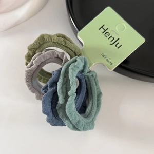 Set of 4 elastic hair scrunchies in olive green, gray, and blue Morandi tones