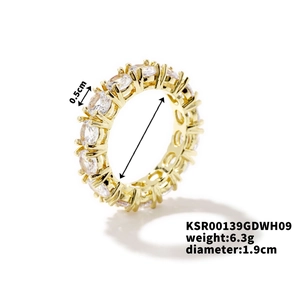 Macro detail of gold plated cubic zirconia band ring with 0.5cm width and 6.3g weight