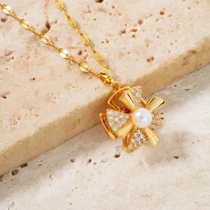 Creative rotating windmill pendant necklace with pearl and gold plating for women
