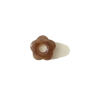 Milk coffee flower hair clip with a sweet smiley face design and marble resin finish