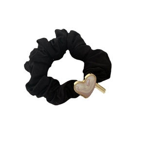 French style black scrunchie with a gold framed pearl heart pendant and handmade tag