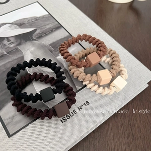 Set of 5 high elasticity spiral phone cord hair ties in earth tones with square beads