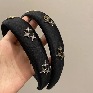 Chic black sponge headband with sparkling rhinestone stars for stylish hair styling