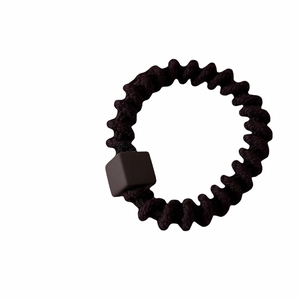 Black spiral hair tie with square cube detail for high ponytails and voluminous buns