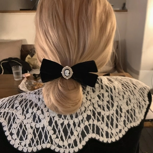 French retro black velvet bow hair scrunchie with a vintage cameo portrait relief